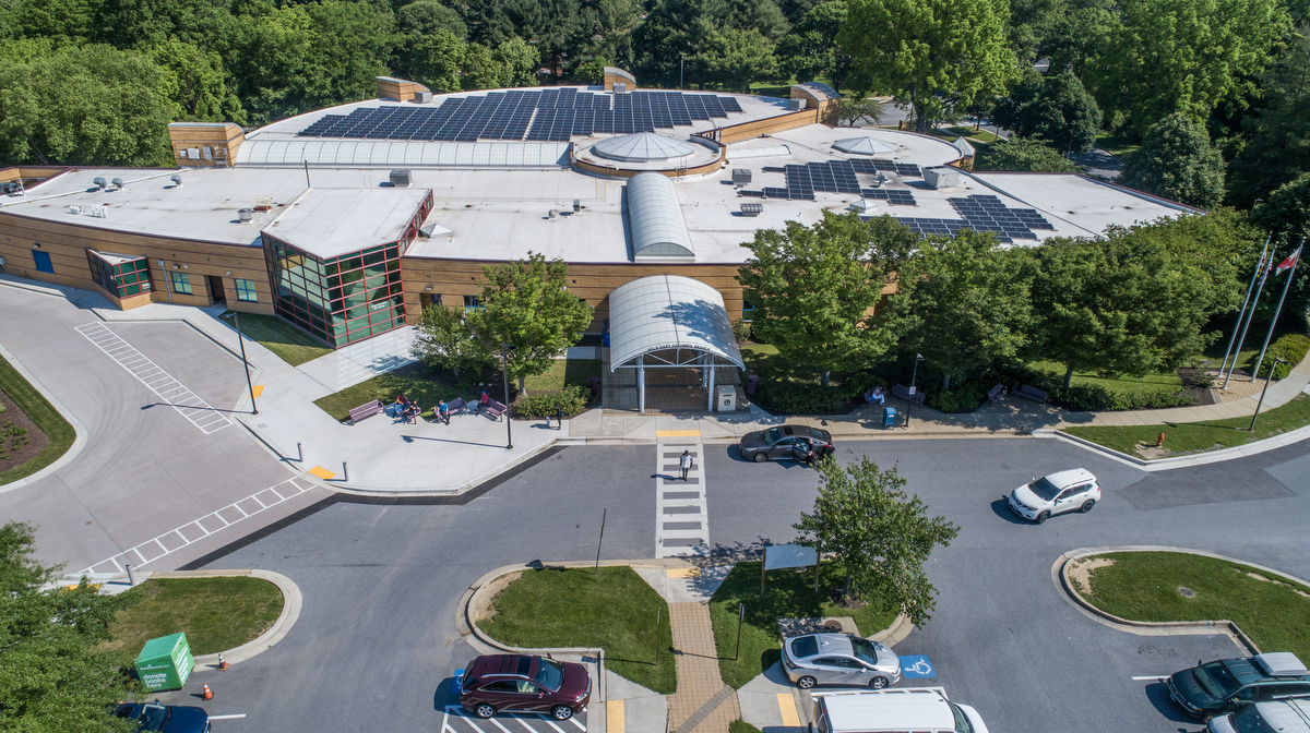 A large library with skylights and solar panels on roof.