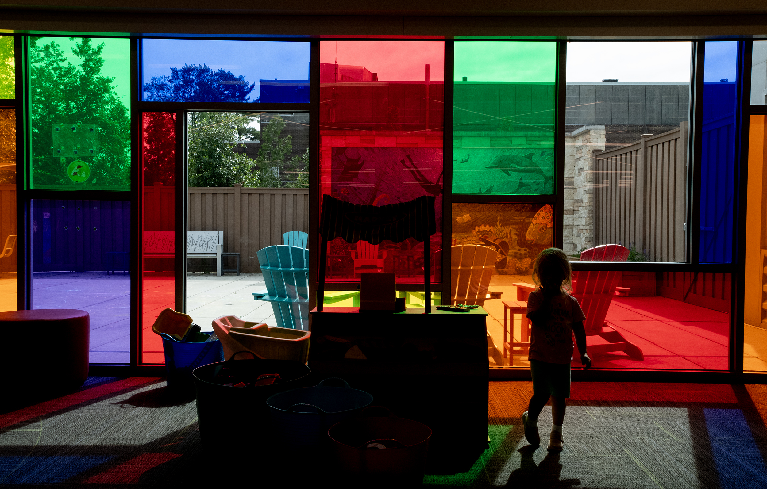 children's Play space with colorful windows and toys.