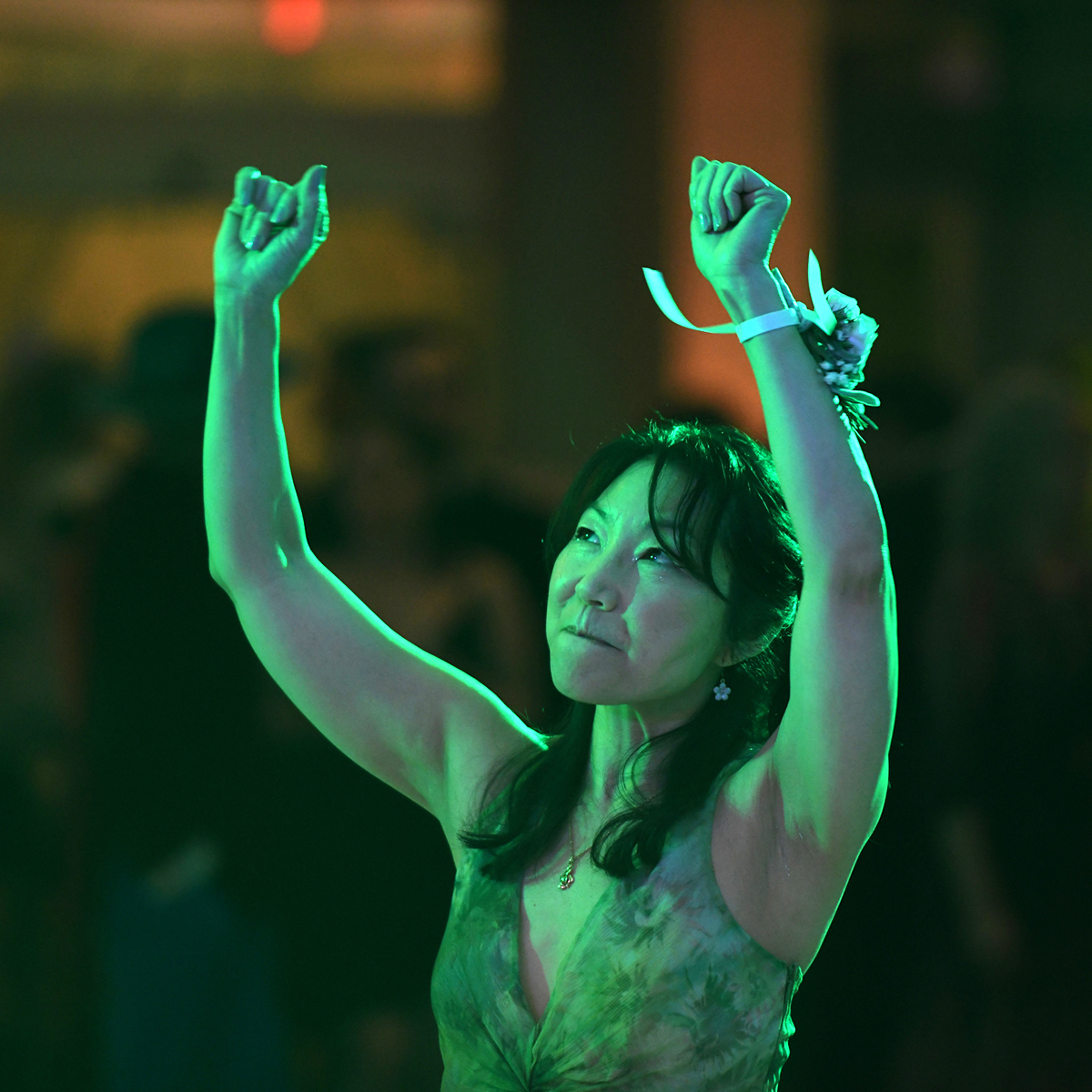 A women dancing with mood lighting.