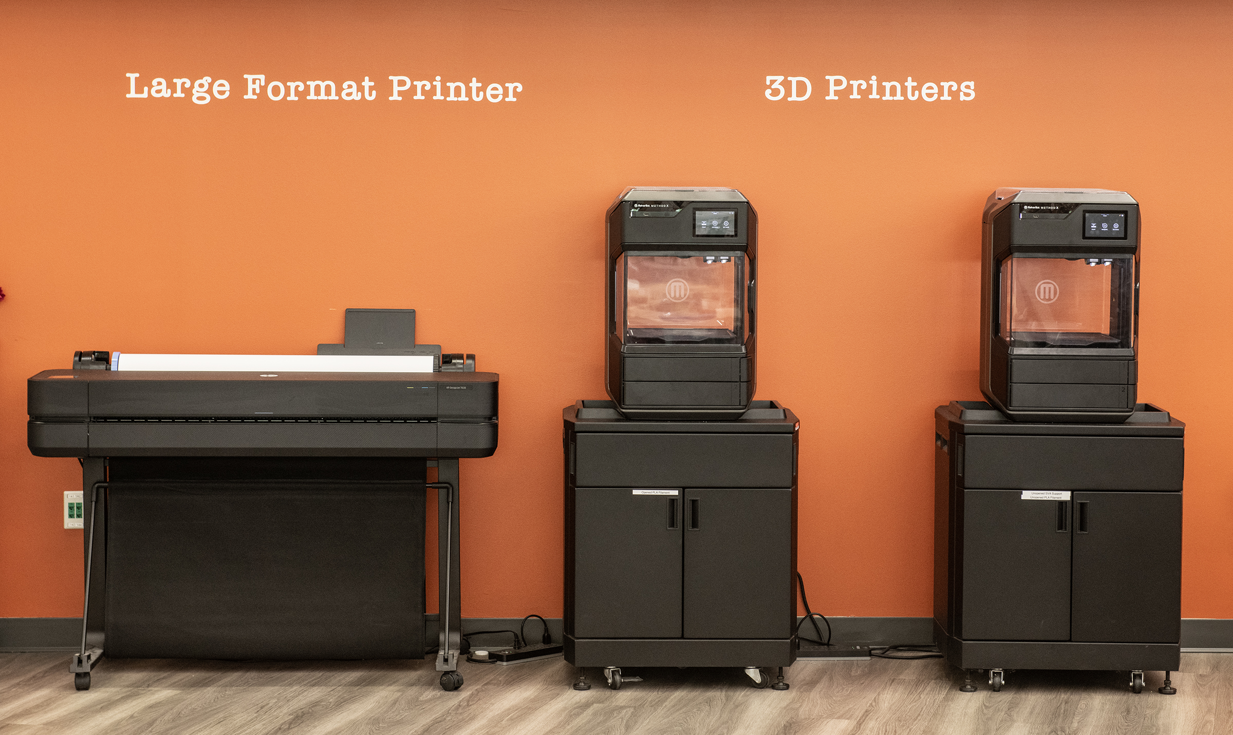 Makerspace with free fabrication tools, including 3D printing, poster printer, laser engraver, and digital media station to convert old photos and music.