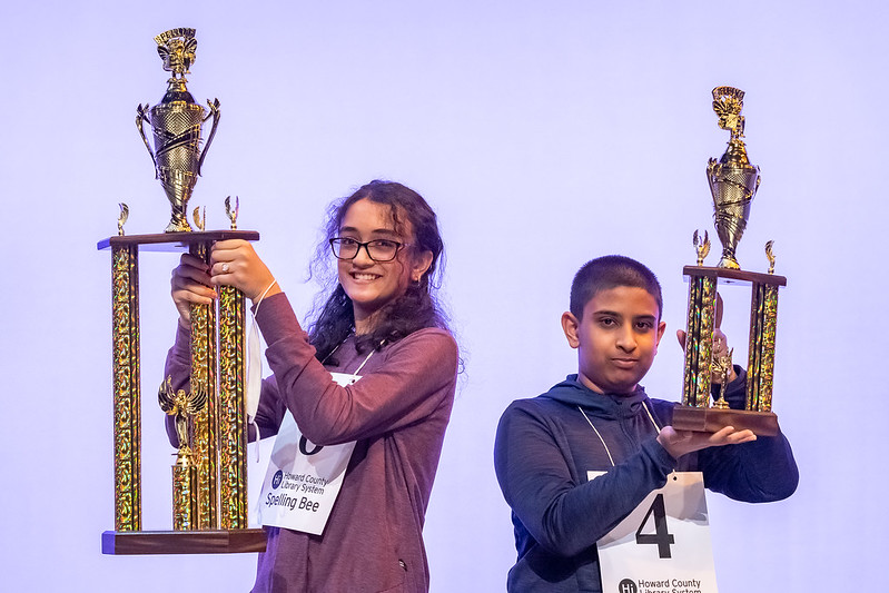 first and 2nd place winners holding trophies.