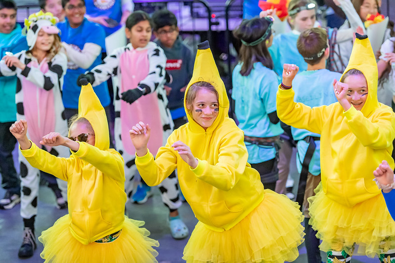 Girls in Banana costumes dancing.