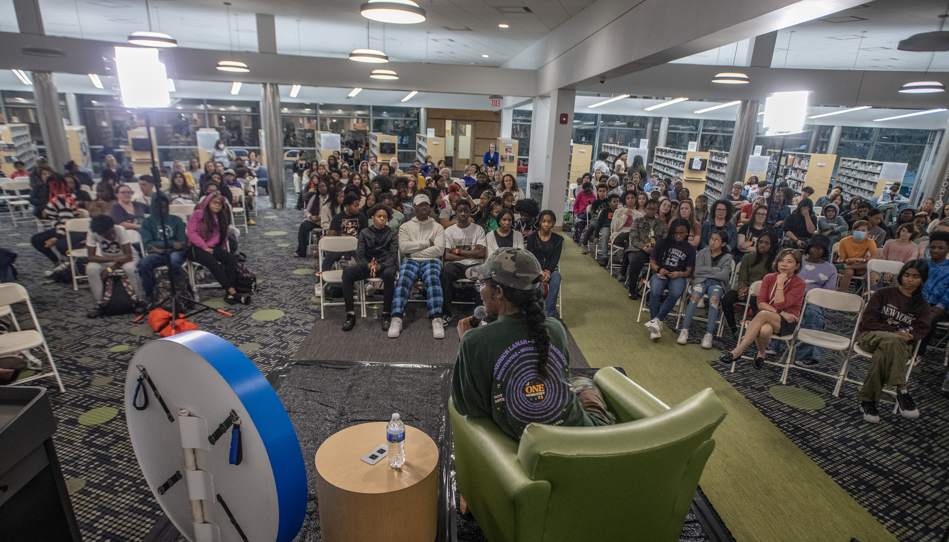 Teenagers listening to Author talk.