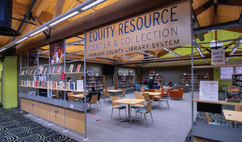 Interior of the Equity Resource Center & Collection at Howard County Library System, featuring open seating, bookshelves, and a welcoming space for learning and community connection.