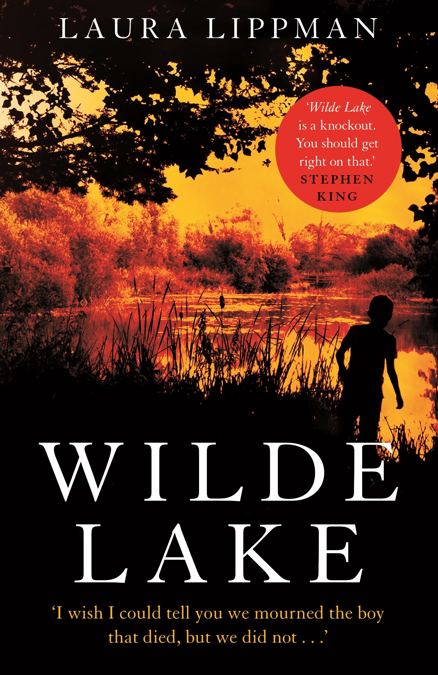 Wilde Lake by Laura Lippman, showing a small figure next to a lake at sunset.
